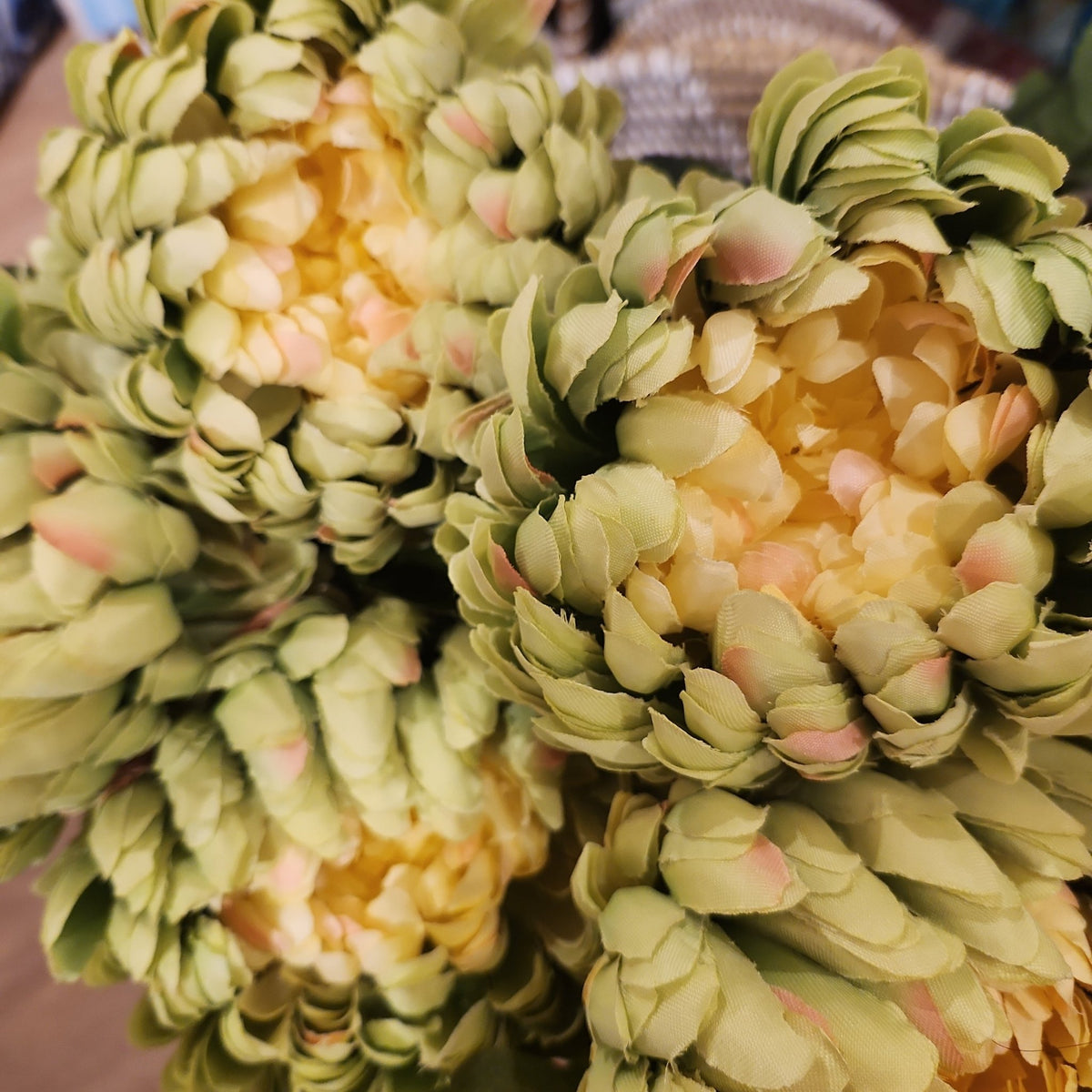 A large artificial peony seen from the side, offered in magenta, deep pink, lilac, light green or cream