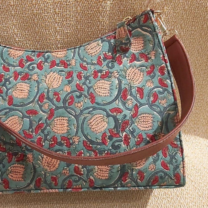 Colourful block-printed shoulder bag with a contrast lining and inner pocket, generously sized