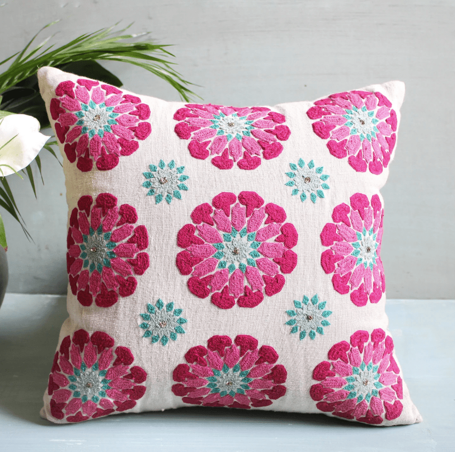 Hand-embroidered linen suzani cushion cover in pink and turquoise with metal sequins, 45 x 45 cm