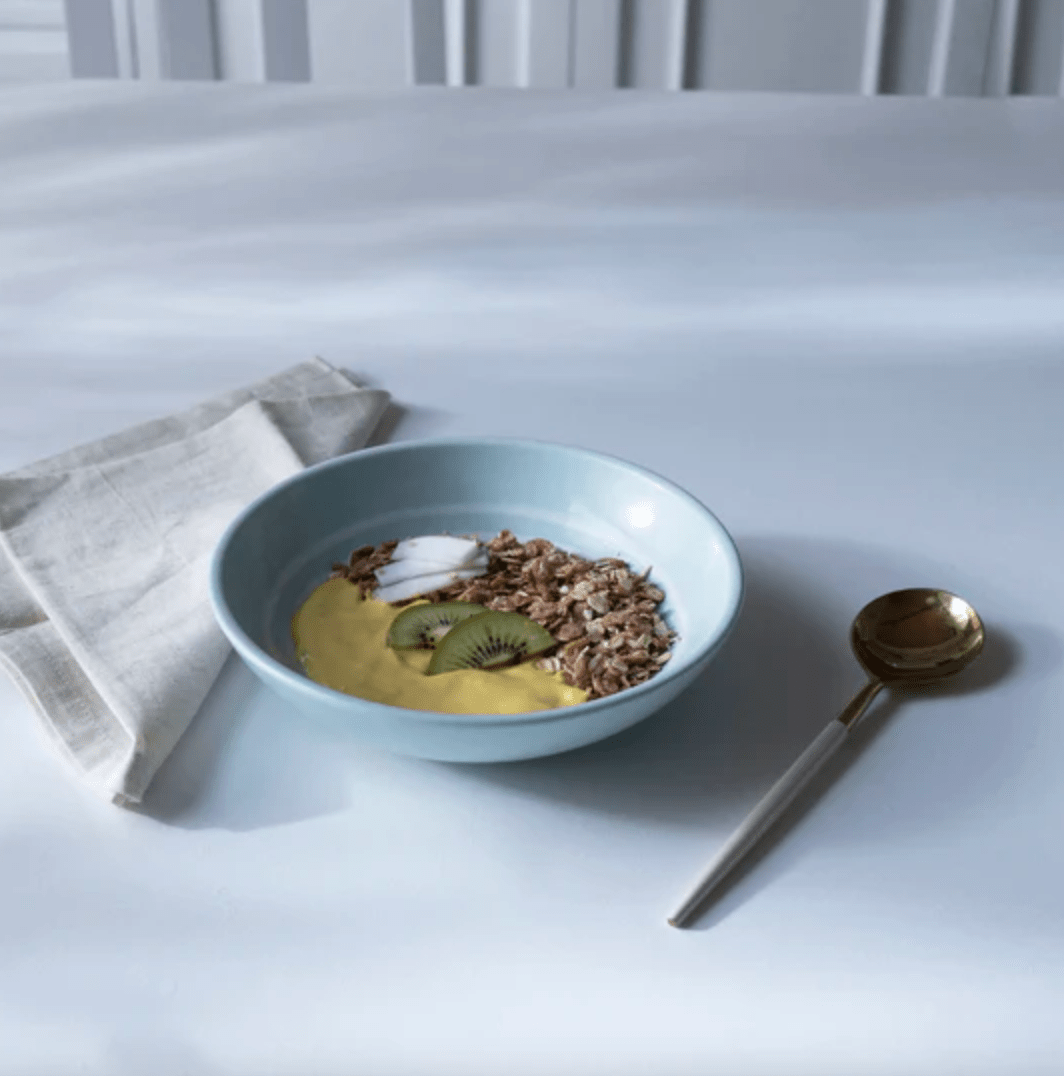 Handcrafted ceramic cereal bowl with blue stripes, 17.75 cm wide and 400 ml, for snacks or salad