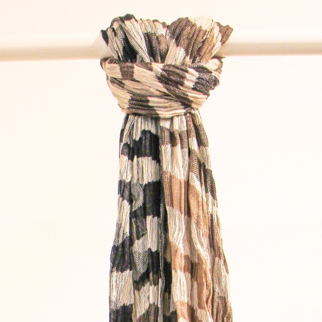 Handwoven silk scarf in a brown diagonal design, lightweight artisan scarf, an elegant accessory for any season.