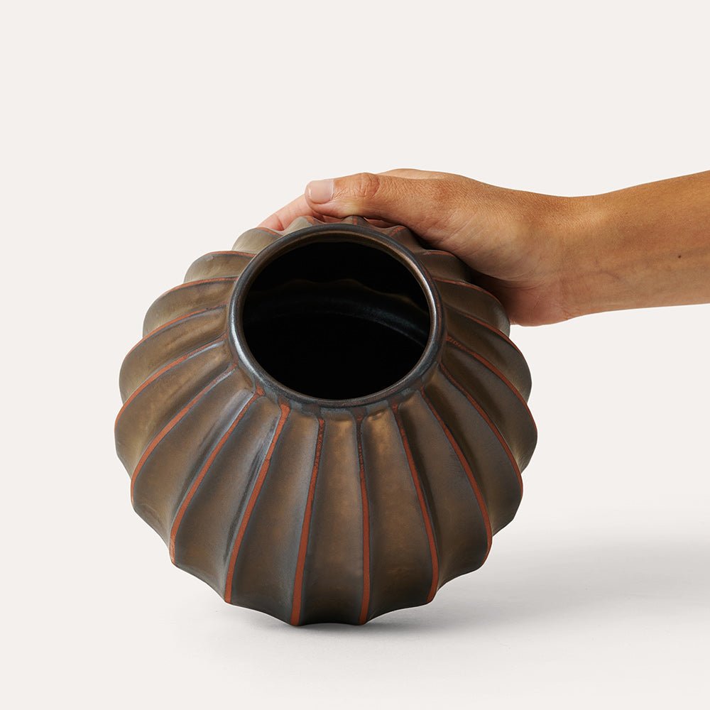 Salon Round Vase Bronze, part of the Vases collection at Inside Living Singapore, styled in a home setting.