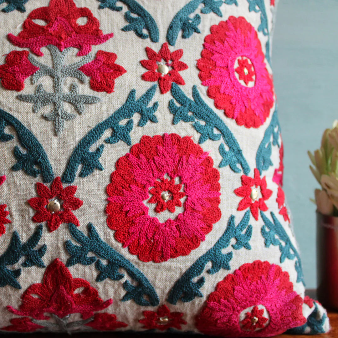 Suzani Niksaar linen cushion in red and blue with embroidered detail, from Inside Living Singapore Front view.