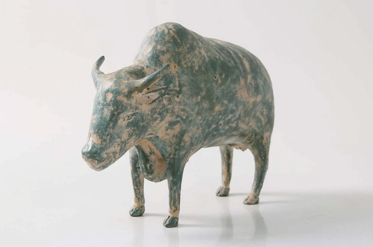 Hand-painted resin water buffalo sculpture with a verdigris patina, 20 x 5 x 14.5 cm
