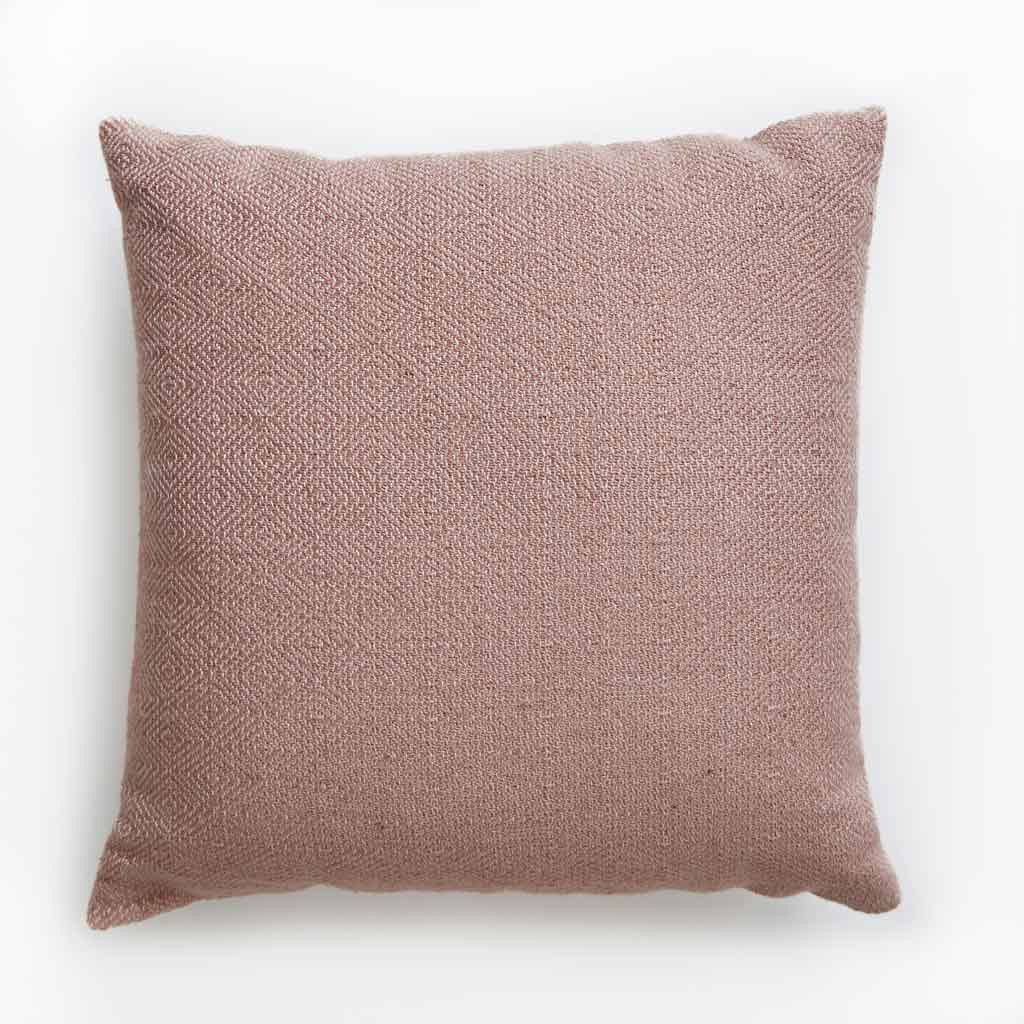 Coral diamond cushion, scatter cushion with a geometric diamond pattern in coral, warm decorative sofa accent.