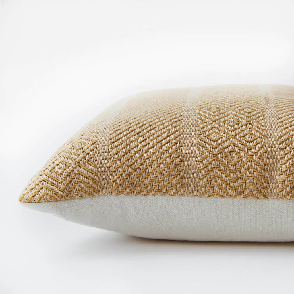 Gold Minerva cushion detail, patterned cushion in gold adding a rich, warm accent to seating or bedding.