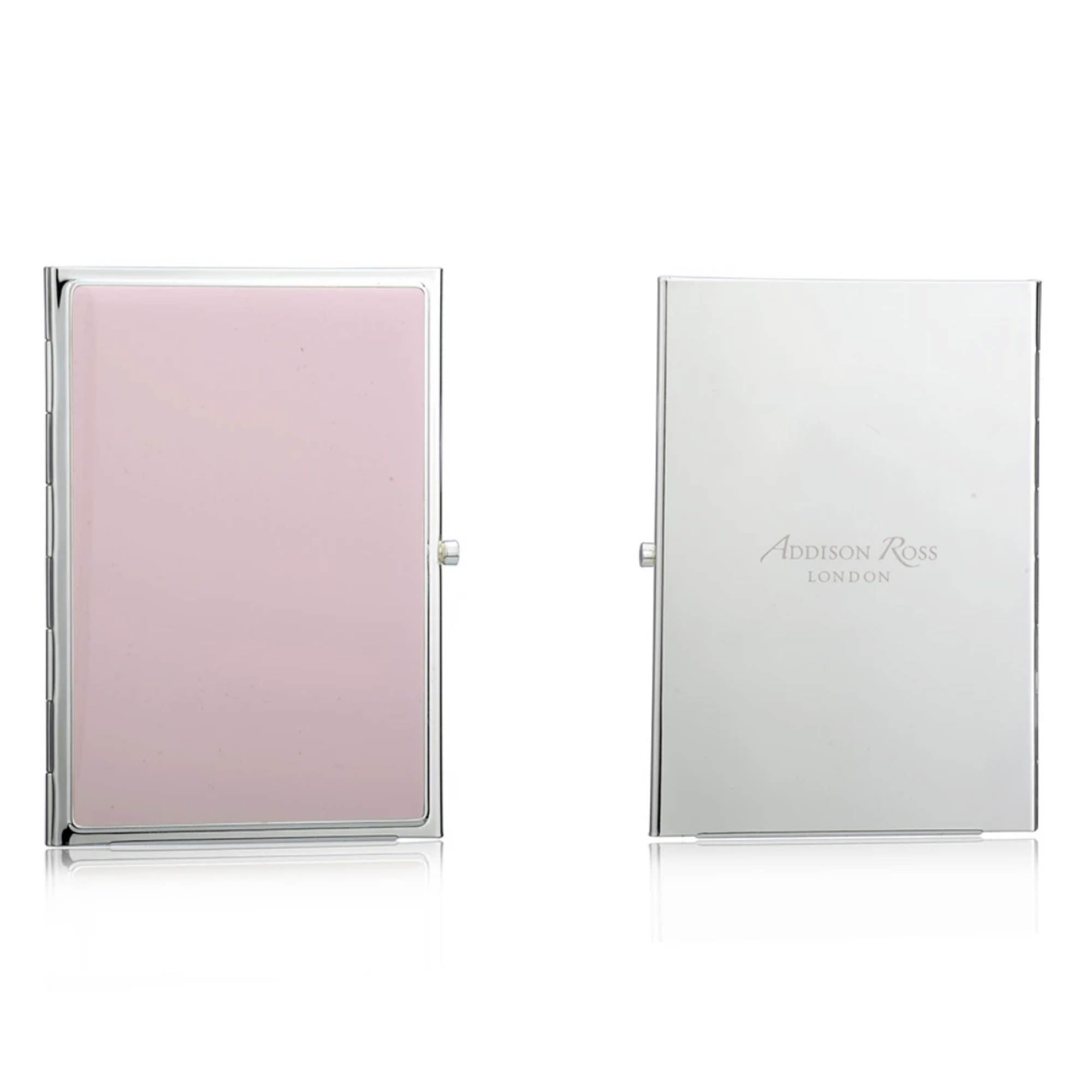 Silver-plate travel photo frame in pastel pink enamel, holds two 2 x 3 inch portrait photos
