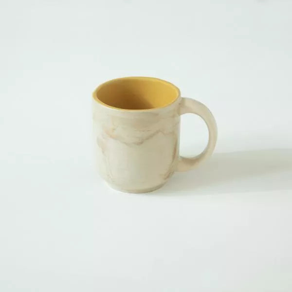Amber Love ceramic mug detail, glazed stoneware mug in amber hue for hot drinks, cosy kitchen tableware.