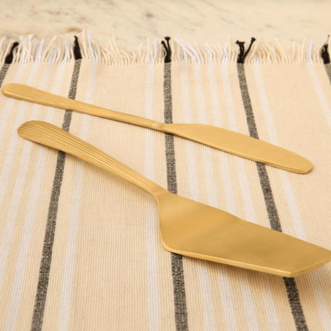 Celestial Brass Cake Slice Spoon Set of 2 from Inside Living Singapore. Detail view.