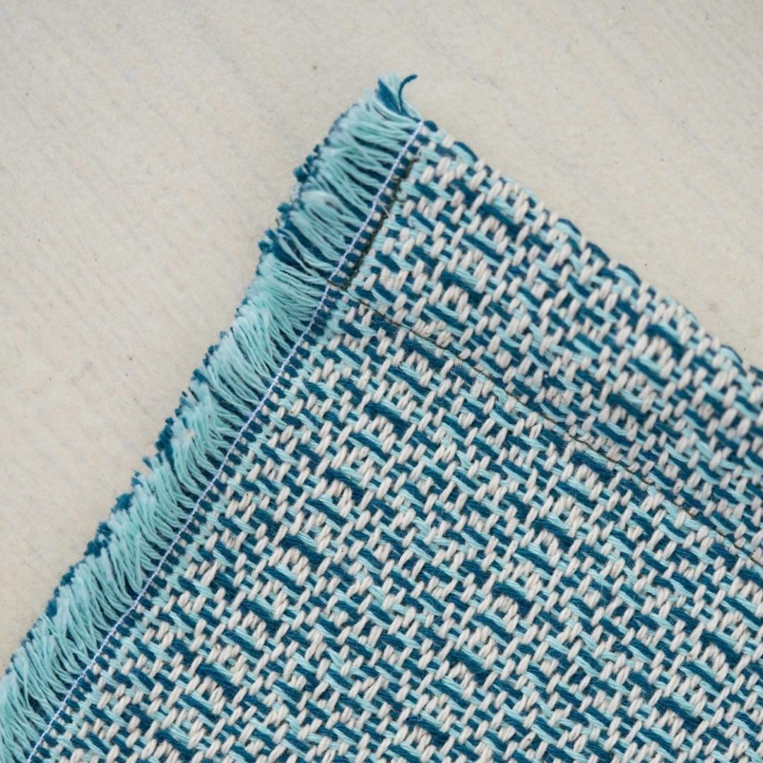 Recycled Cotton Tablecloth, side view, from the Inside Living Singapore homeware collection.