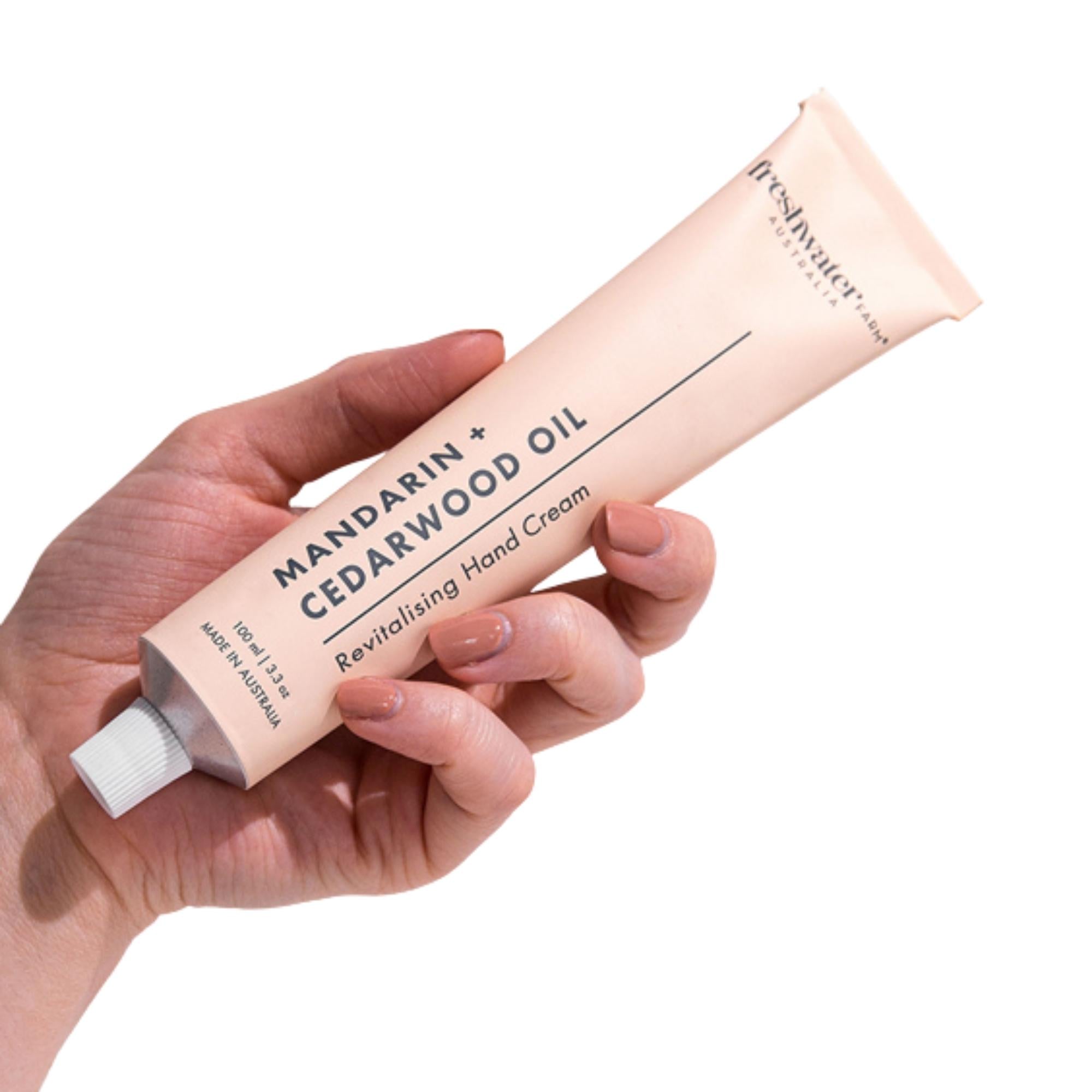Revitalising Mandarin Cedarwood Hand Cream from Inside Living Singapore. Shown front view.