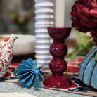 Bobbin Candlestick Cherry, candlestick holder at Inside Living Singapore. Side view.