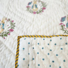 Peter Rabbit child's quilt, 40 x 60 inches, reversible with blue polka dots on a white ground on the other side