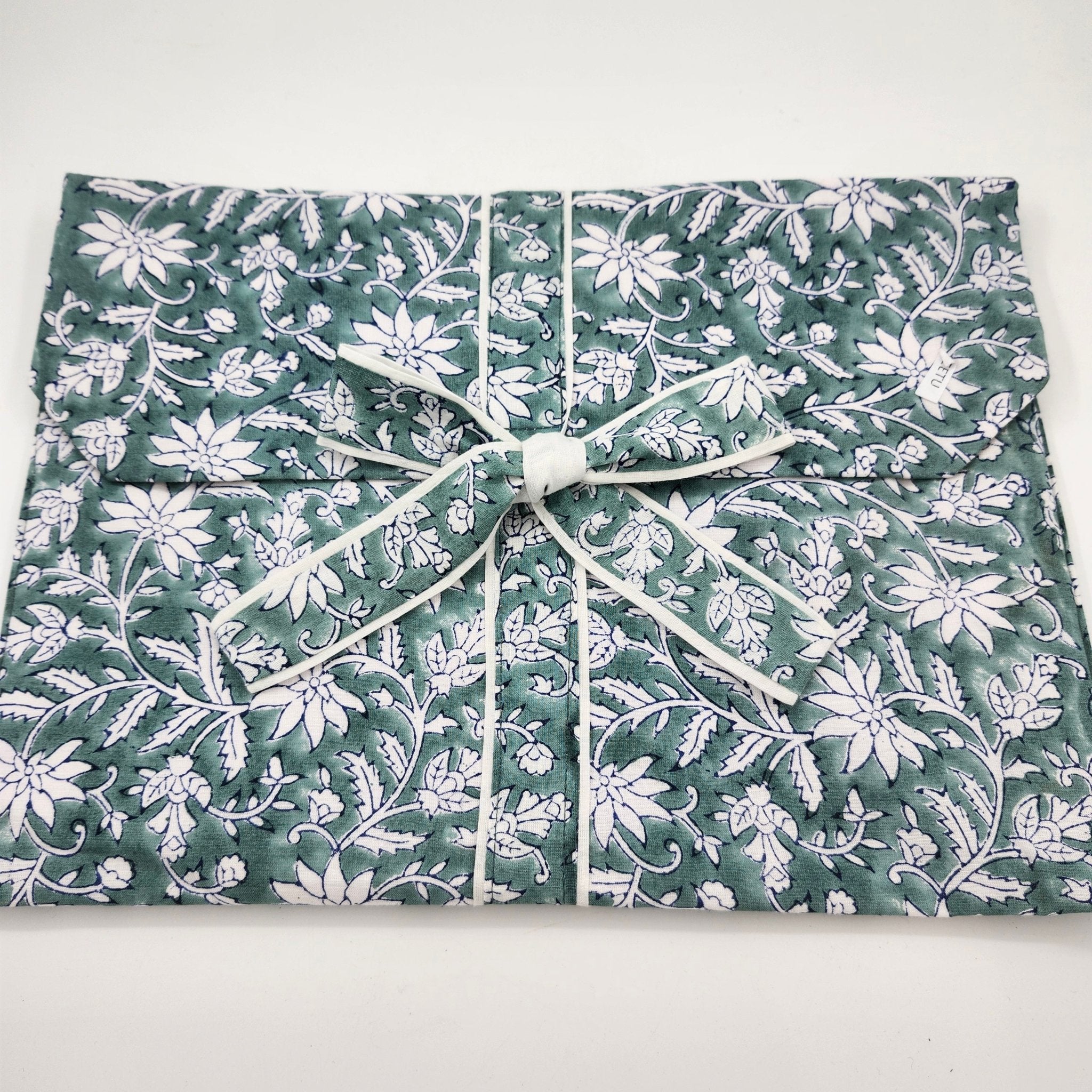 Block printed cotton short pyjama set, white floral print on teal, short-sleeved top and drawstring shorts