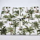 Short-sleeved cotton pyjamas in the Little Palms block print, with a top and drawstring shorts