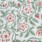Reversible green trellis block print single quilt, made with carved wooden or brass blocks on cotton