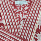 Cotton block print robe in festive red, handmade lightweight dressing gown with hand-printed pattern, close-up view
