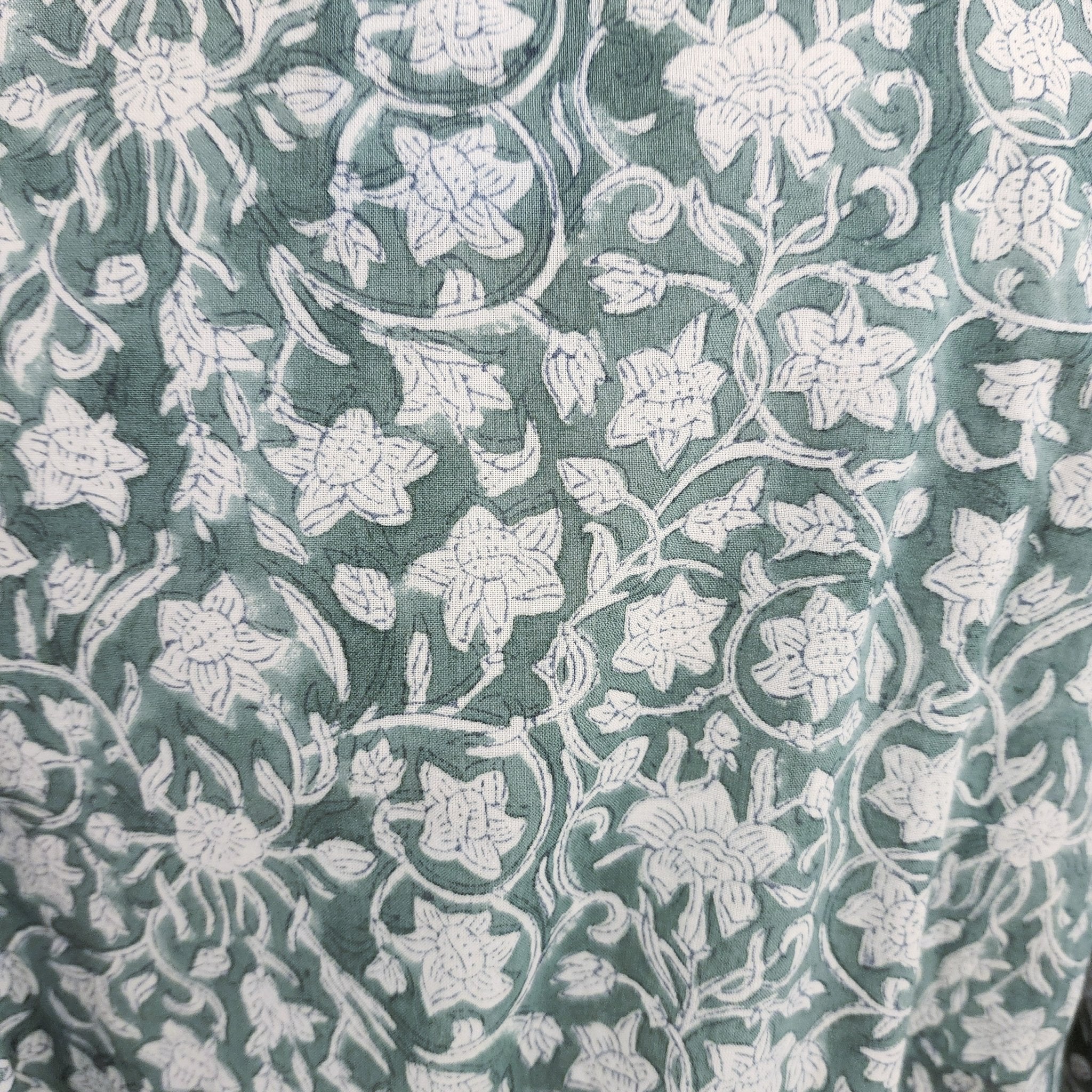 Cotton block print robe in floral green, handmade lightweight dressing gown with hand-printed pattern, close-up view