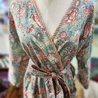 Cotton block print robe in hibiscus design, handmade lightweight dressing gown with hand-printed pattern, close-up view