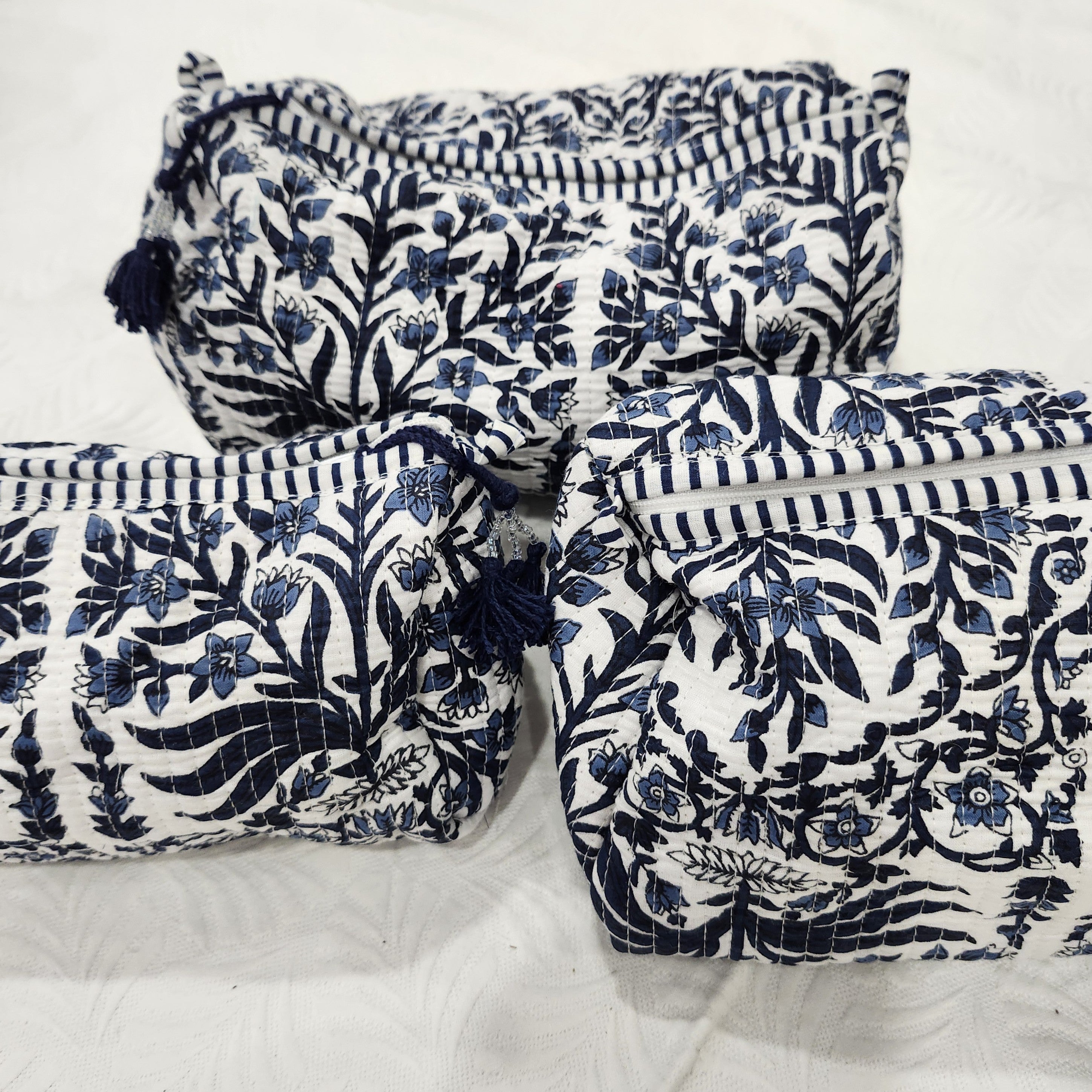 Block print cotton wash bag in floral blue, handmade toiletry and travel pouch for bathroom essentials