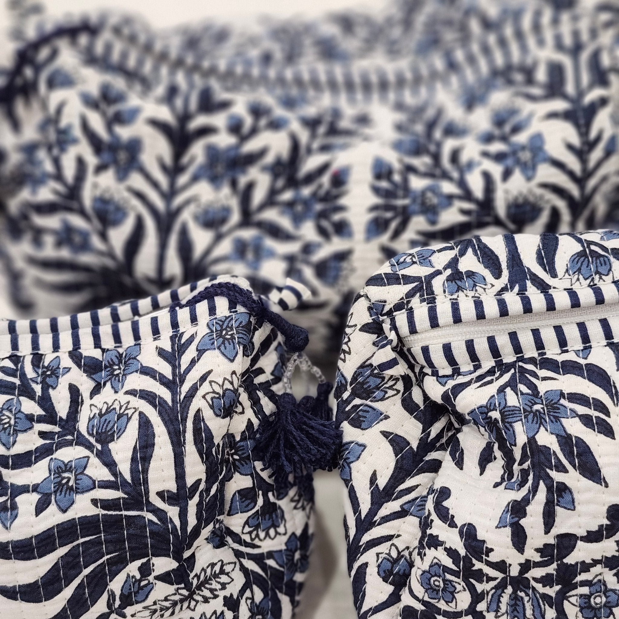 Block print cotton wash bag in floral blue, handmade toiletry and travel pouch for bathroom essentials, detail view