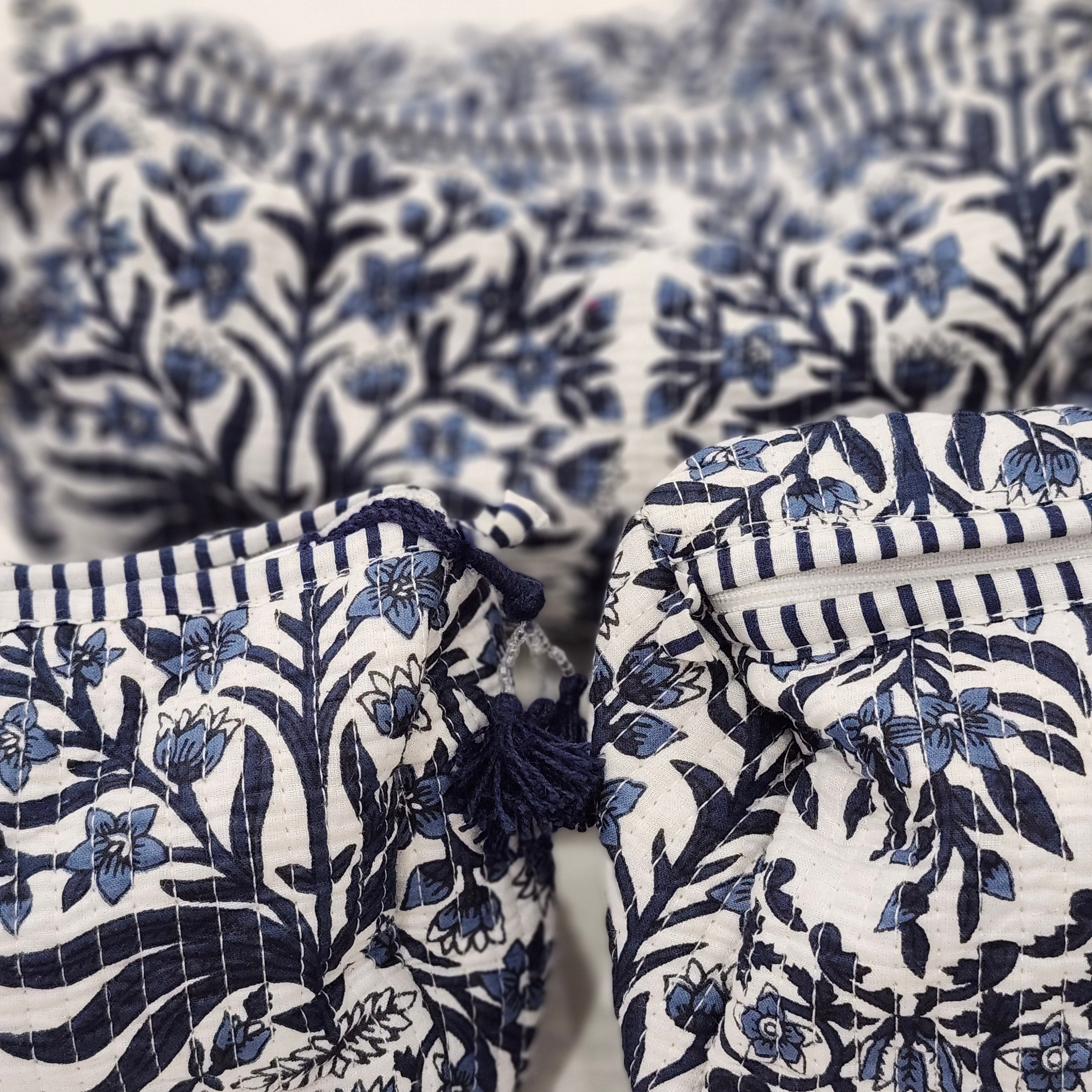 Block print cotton wash bag in floral blue, handmade toiletry and travel pouch for bathroom essentials, detail view
