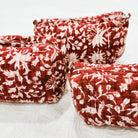 Block print cotton wash bag in festive red, handmade toiletry and travel pouch for bathroom essentials