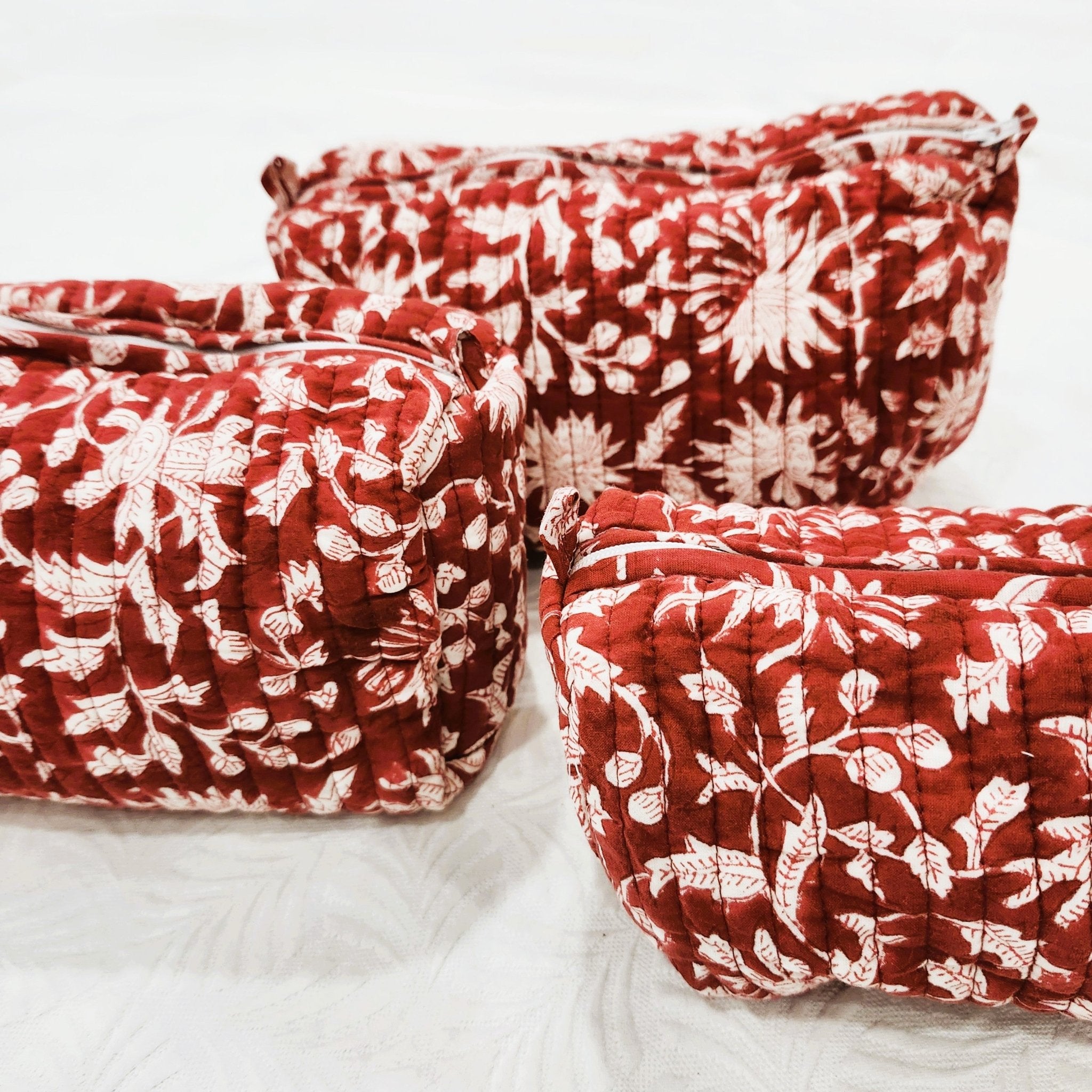 Block print cotton wash bag in festive red, handmade toiletry and travel pouch for bathroom essentials