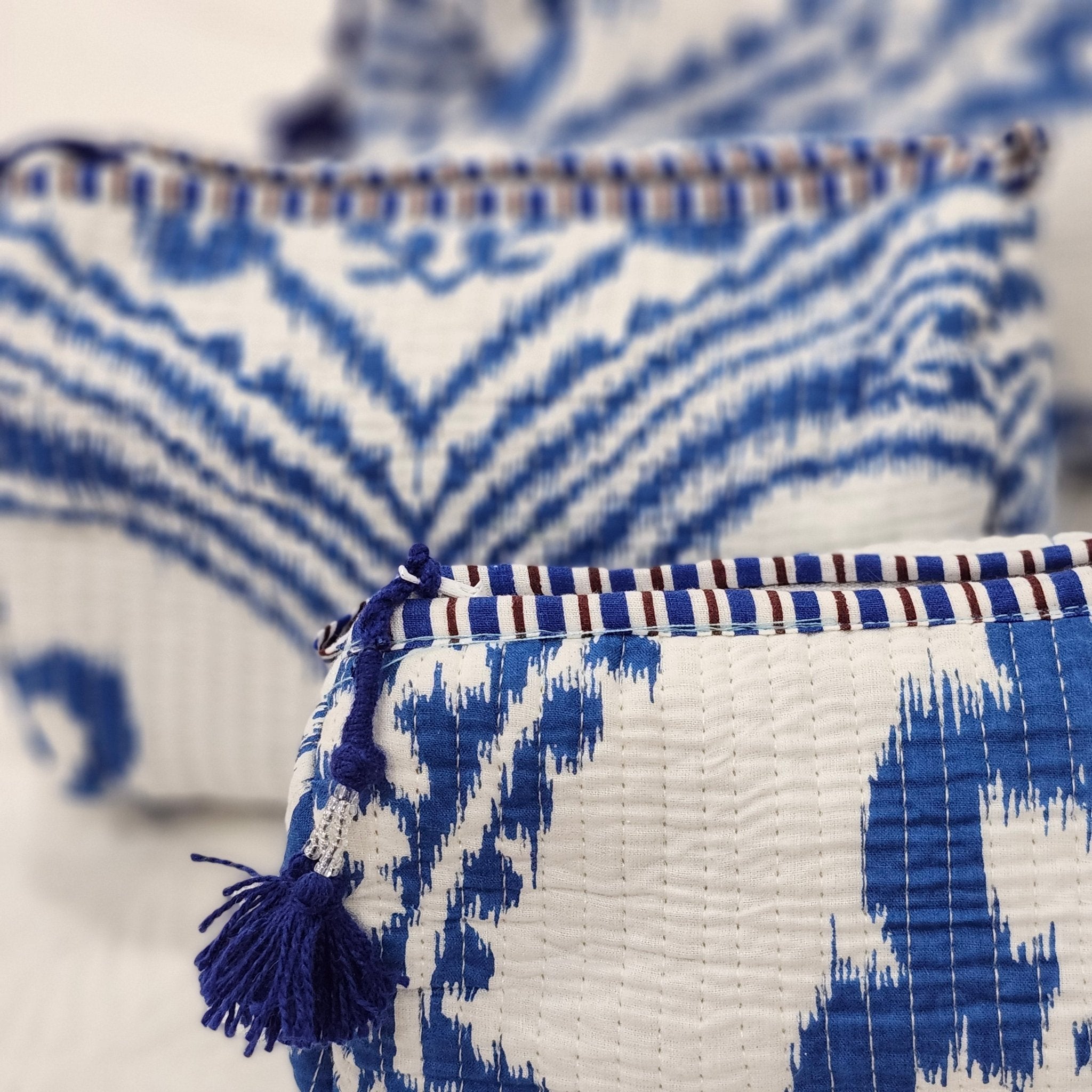 Block print cotton wash bag in ikat pattern, handmade toiletry and travel pouch for bathroom essentials, detail view
