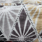 Block printed wash bag in tribal geometric print of tan, taupe, grey and black, lined, three sizes