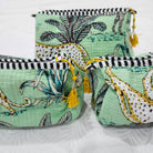 Block printed wash bag in safari print with zebras, birds, cheetahs and palms, tassel zip, three sizes