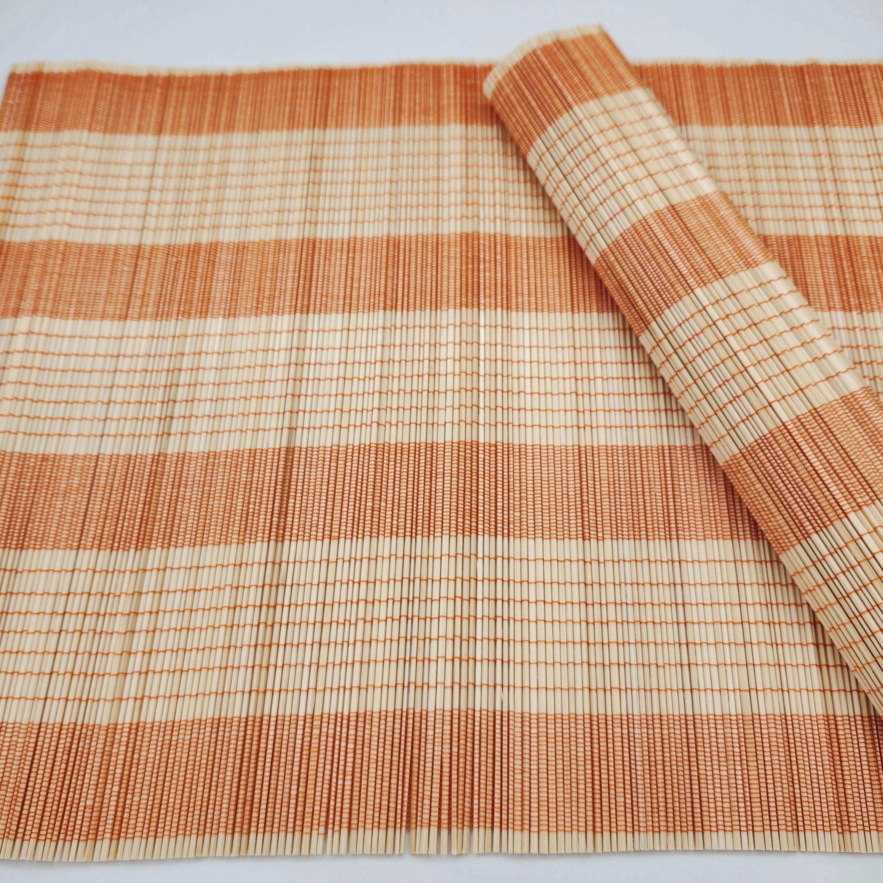 Orange woven bamboo placemat for everyday or festive dining, 38 x 30 cm