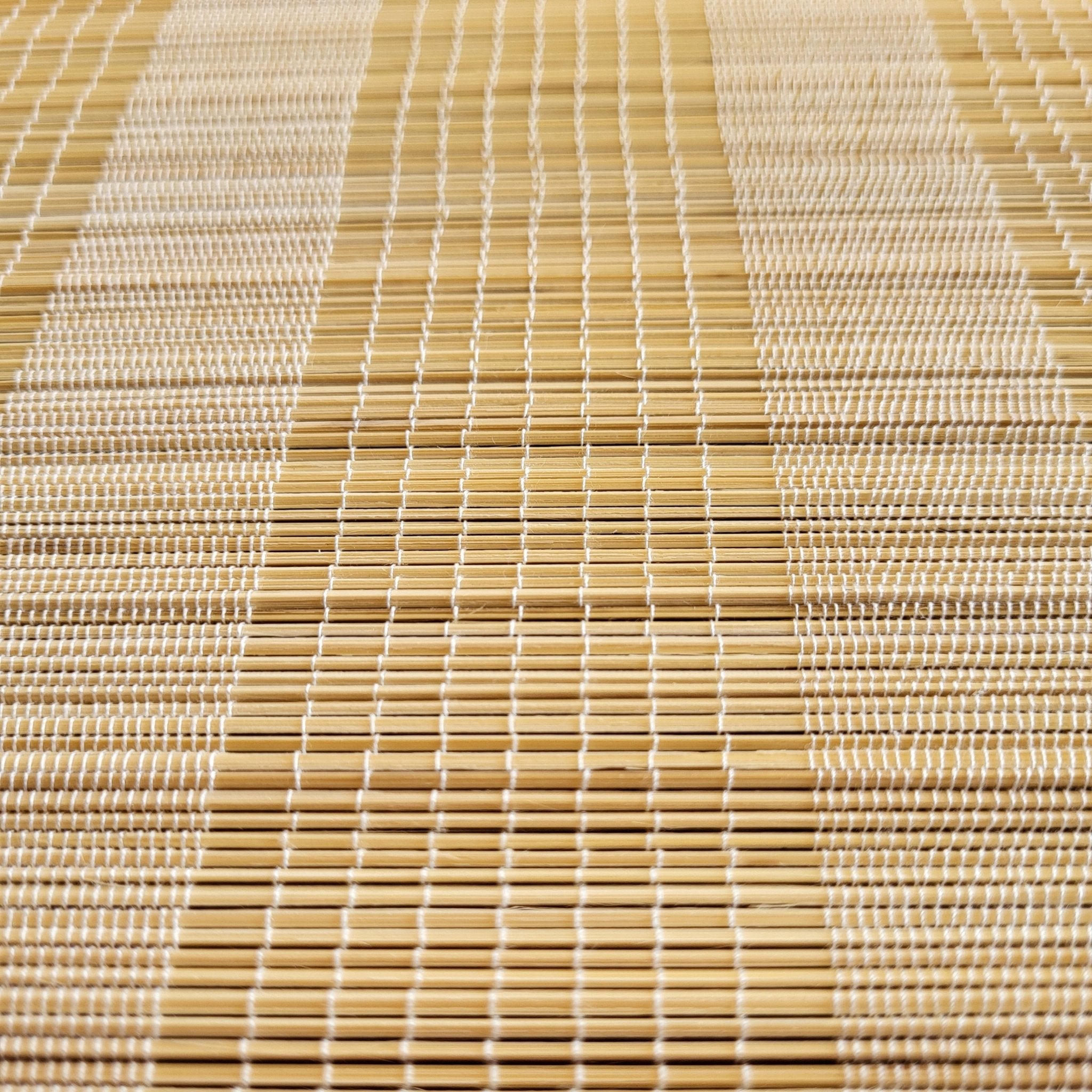 Natural bamboo placemat from Inside Living, woven table mat for everyday and special dining settings, side view