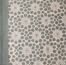 Bluey-green cotton tablecloth block-printed with floral and geometric motifs, machine washable