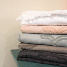 Bô towel charcoal folded, soft cotton bath towel in charcoal grey adding plush comfort to the bathroom.
