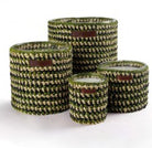 Date and patchouli scented soy candle with a handwoven raphia exterior, three sizes available