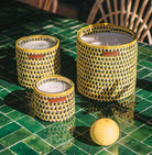 Jasmine and citrus scented soy candle with a handwoven raphia exterior, three sizes available