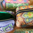 Cosmetic bag made from upcycled vintage silk sari fabric, quilted and silk-lined, 20 x 15 x 8cm