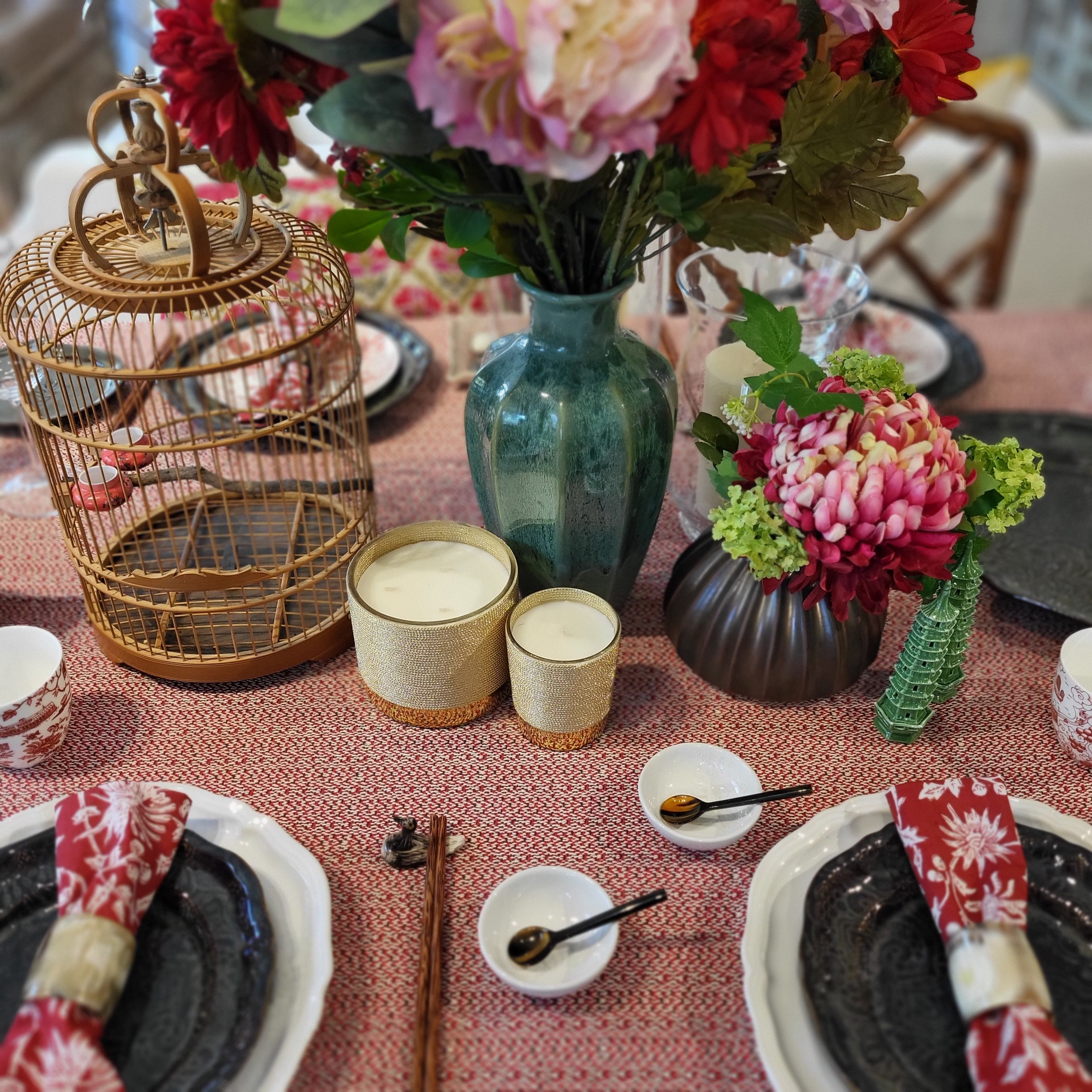 Inside Living Singapore glazed ceramic vases styled together on a Lunar New Year table setting.