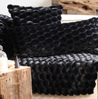 Black throw with raised eggshell pattern and cotton velvet backing, 130 x 170 cm, soft and warm