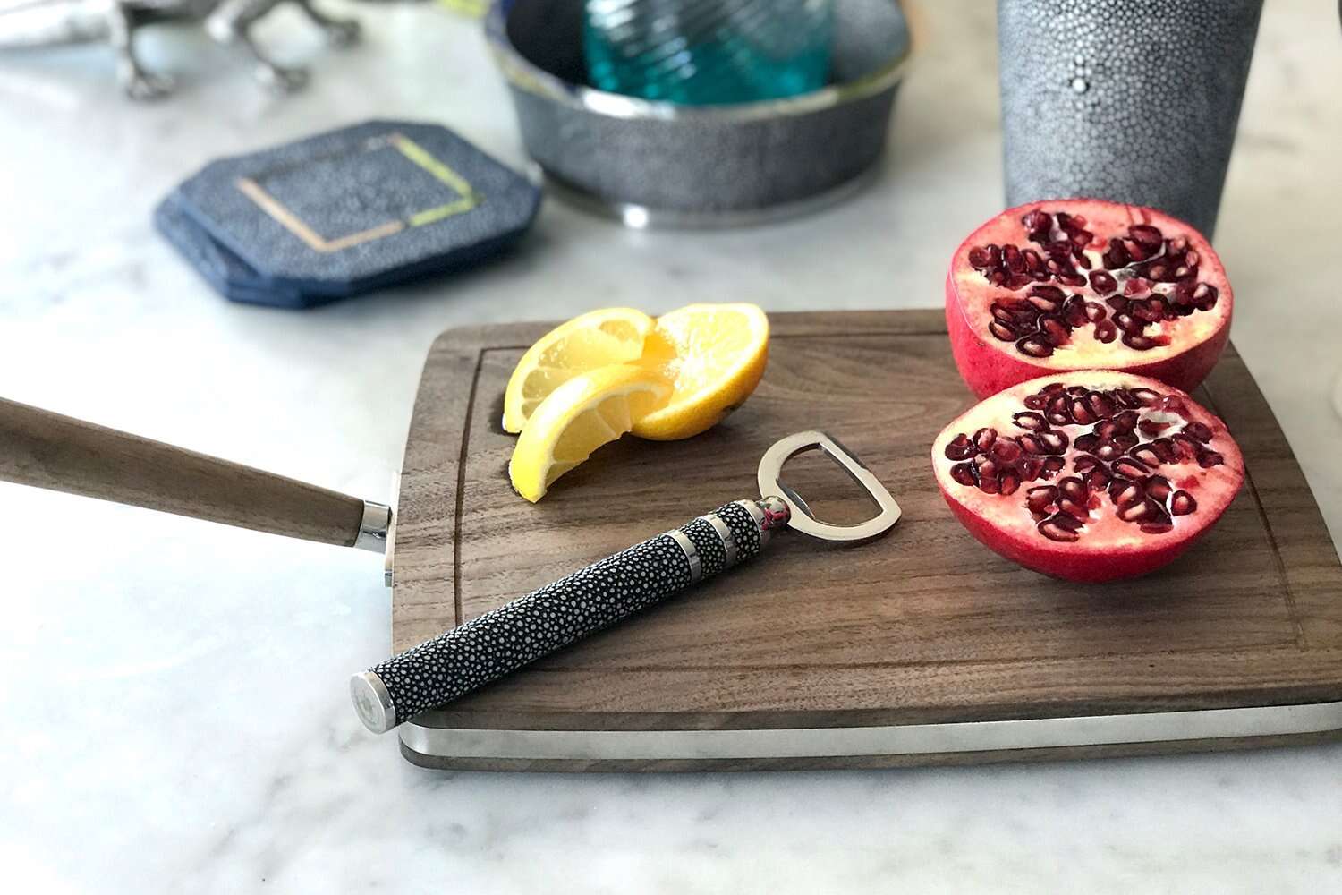 Bottle opener in stainless steel with a charcoal faux shagreen handle, comfortable to hold and easy to use