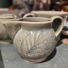Ceramic Creamer shown from another angle, plates at Inside Living Singapore.