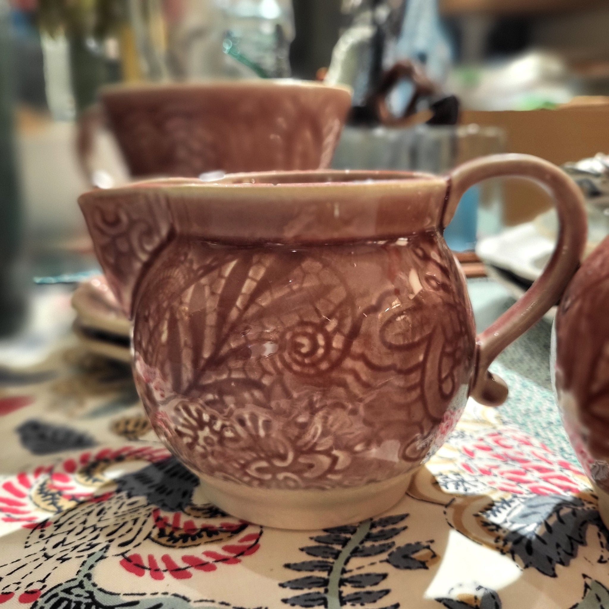 Ceramic Creamer close-up, plates from Inside Living Singapore.