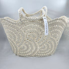 Crochet storage basket in water-resistant woven polyester with a circles design, 50 x 31 x 18cm