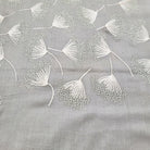 Embroidered pashmina shawl in 'Dandelion' design, soft handmade wrap scarf with fine hand embroidery, close-up view