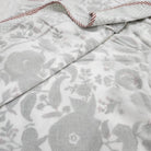 Olive colourway of the pomegranate print single dohar blanket, block printed cotton layered with voile.