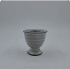 Ceramic egg cup, hand-finished tableware for serving boiled eggs at breakfast, full view