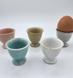 Ceramic egg cup, hand-finished tableware for serving boiled eggs at breakfast, detail view