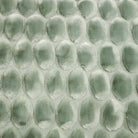 Egg velvet throw in green, 130 x 170 cm, a soft decorative blanket, from Inside Living Singapore Front view.