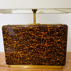 Faux tortoise shell table lamp from Inside Living, decorative home lighting with a warm patterned amber-toned finish
